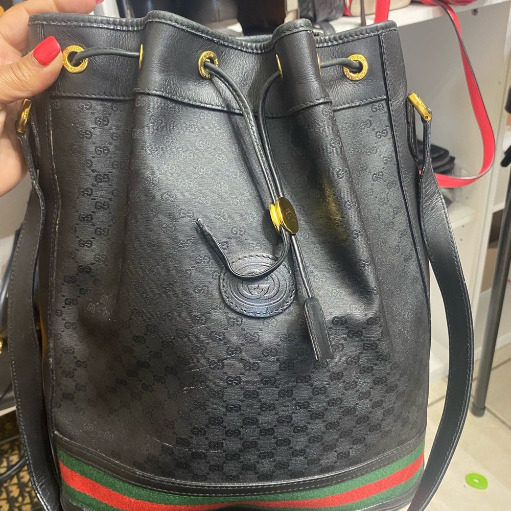 Gucci Black Bucket Bag with Gold Accents